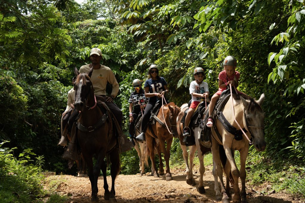 A family horseback ride at La Hacienda Park.